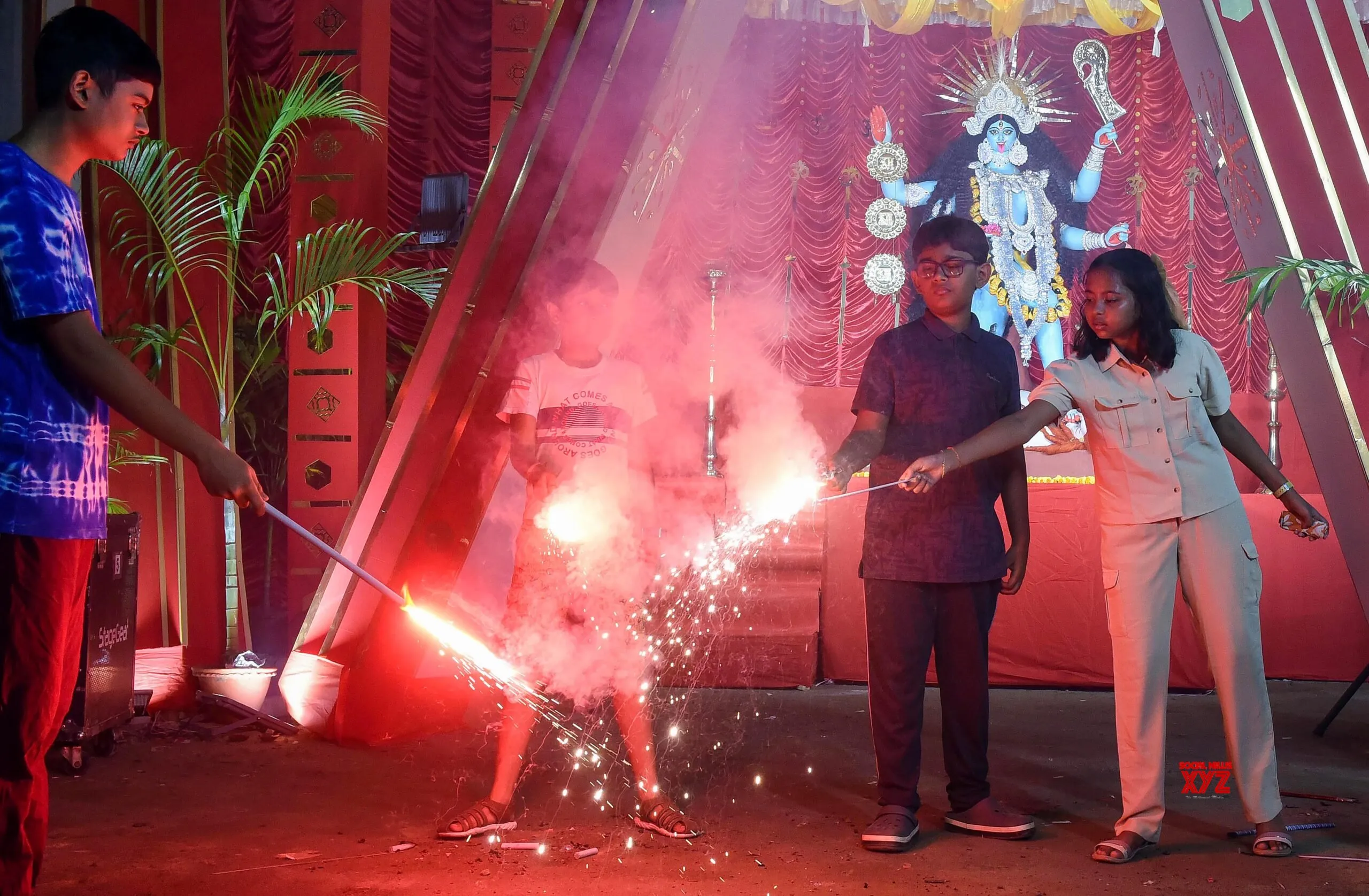 Children celebrate Kali Puja by bursting firecrackers in North Kolkata #Gallery