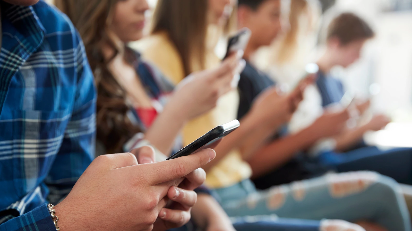 Study finds school cellphone bans may boost test scores after initial disruption
