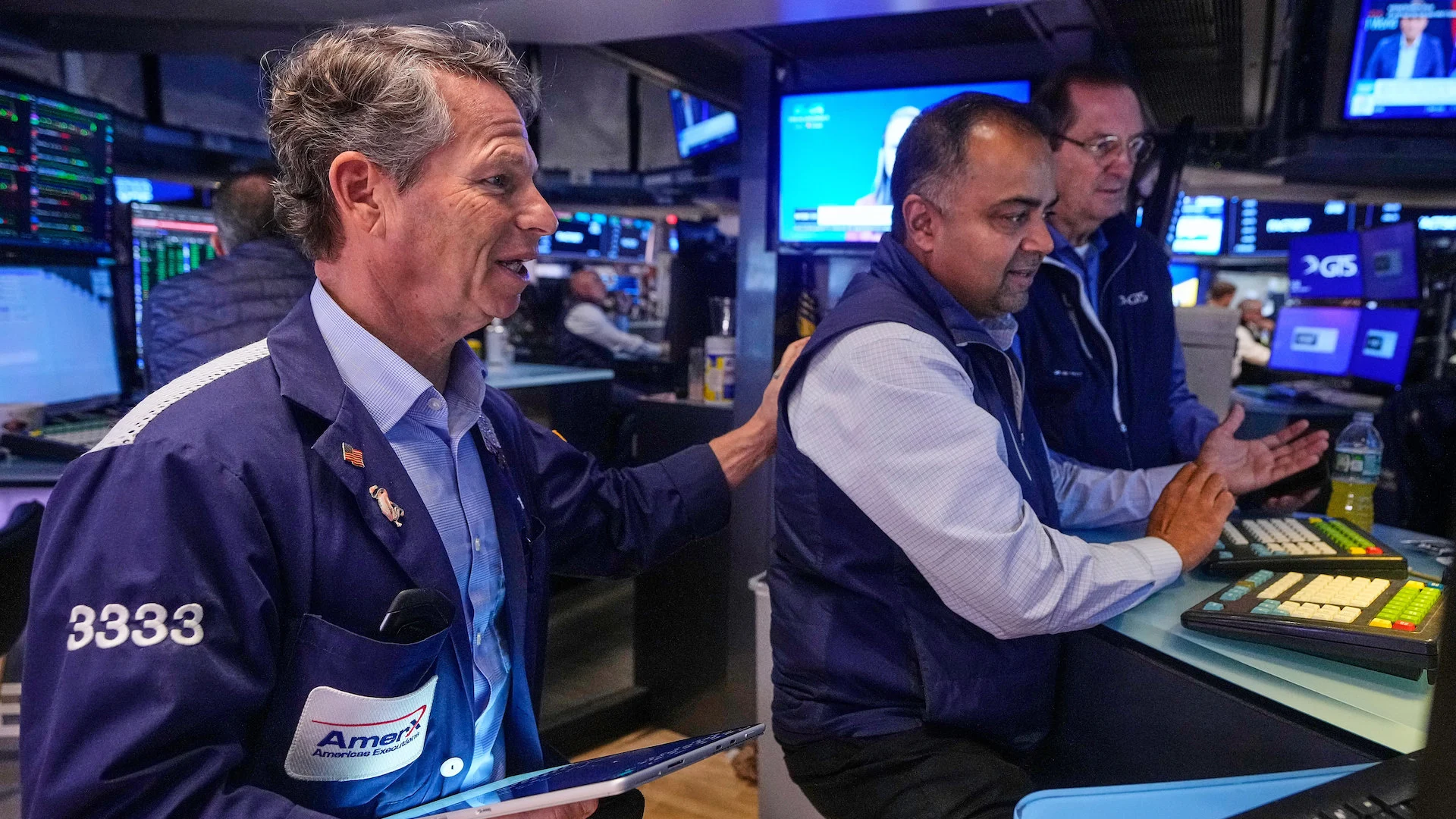 Stock market hovers near records ahead of earnings, inflation data