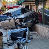 Lincoln business picking up pieces after car crashes into building