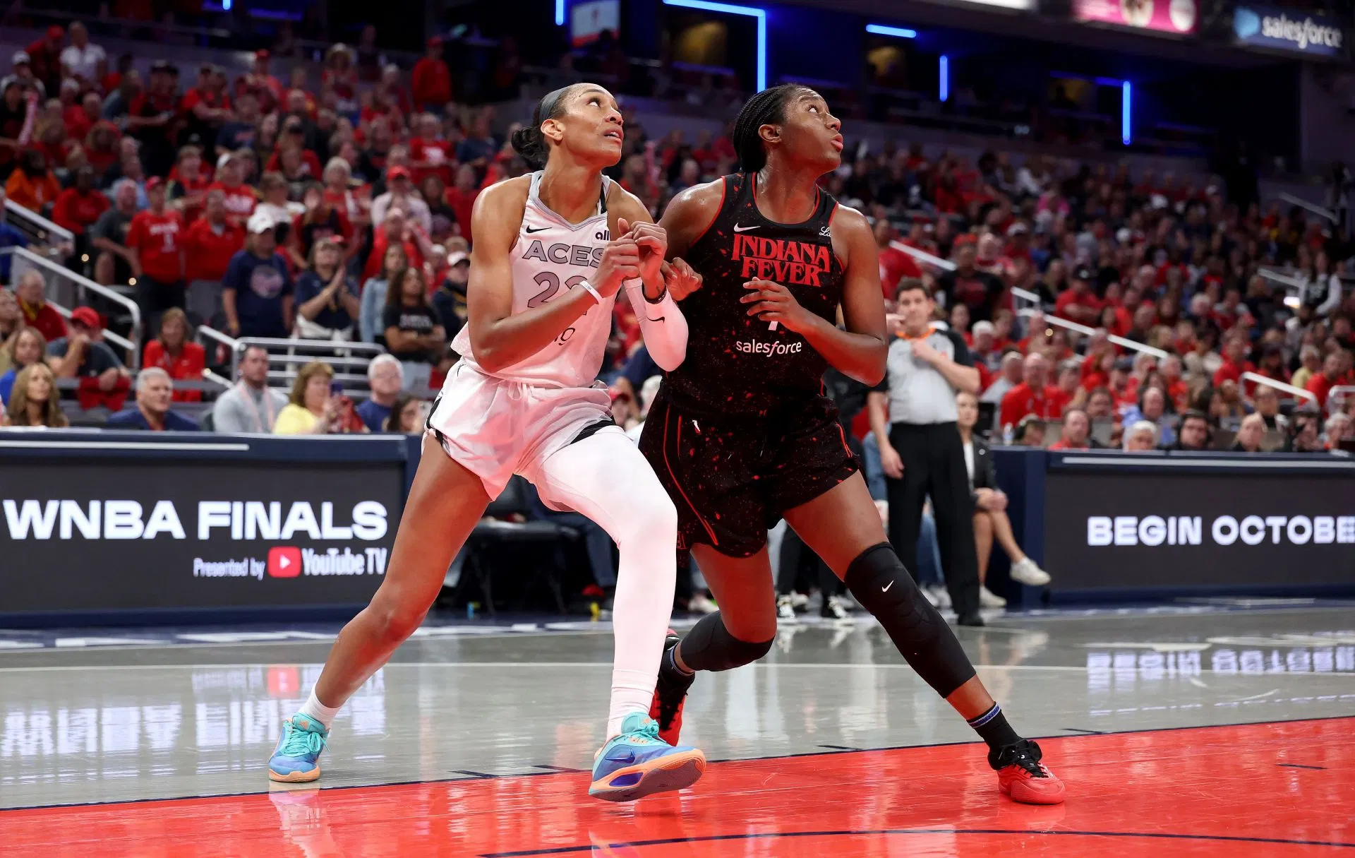 "The look of pure disgust": Fans react to viral image of A'ja Wilson staring down at Aliyah Boston after putting Fever center on the floor