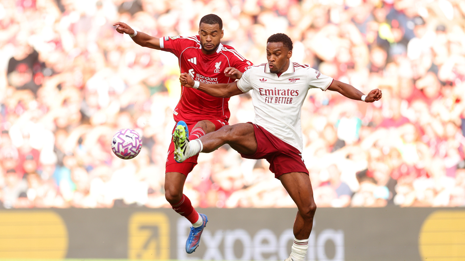 Arsene Wenger says Arsenal have left Liverpool behind after watching Slot’s side collapse
