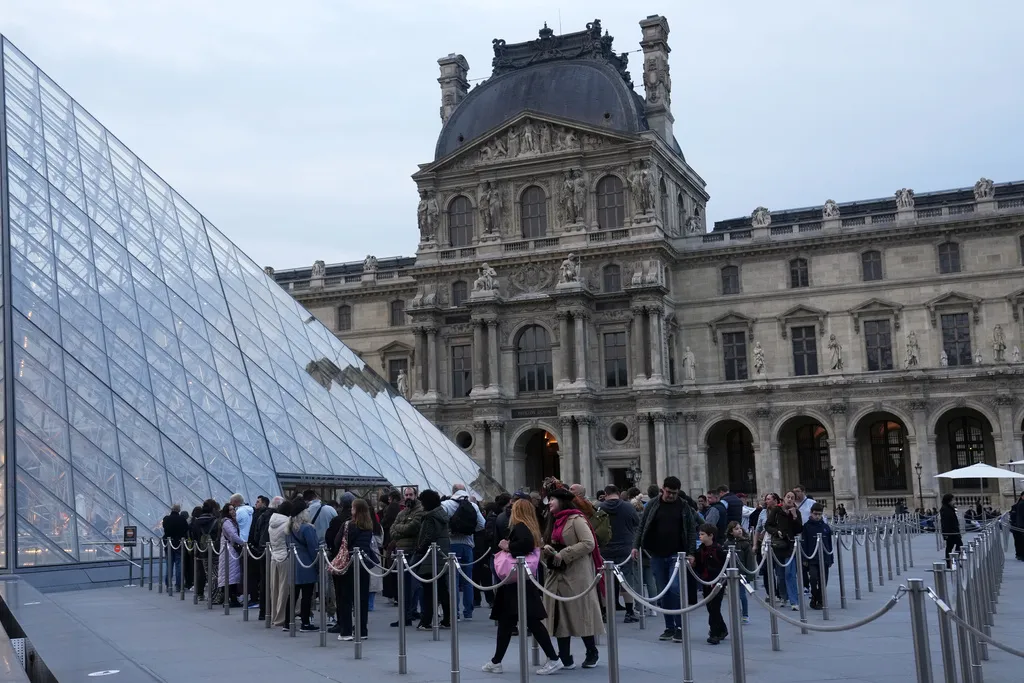 The Louvre reopens even as Paris museum reels after stunning heist