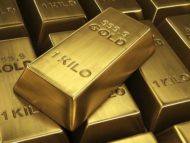 Gold retreats after record surge