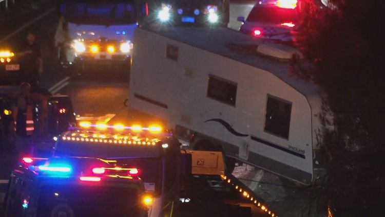 Man accused of hijacking and crashing caravan with three children inside