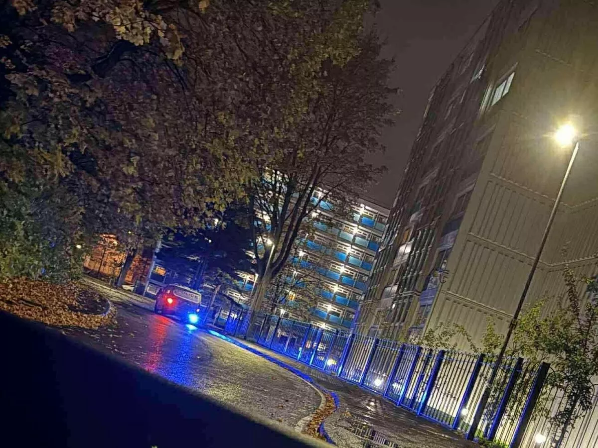 Police issue update after man found dead outside block of flats