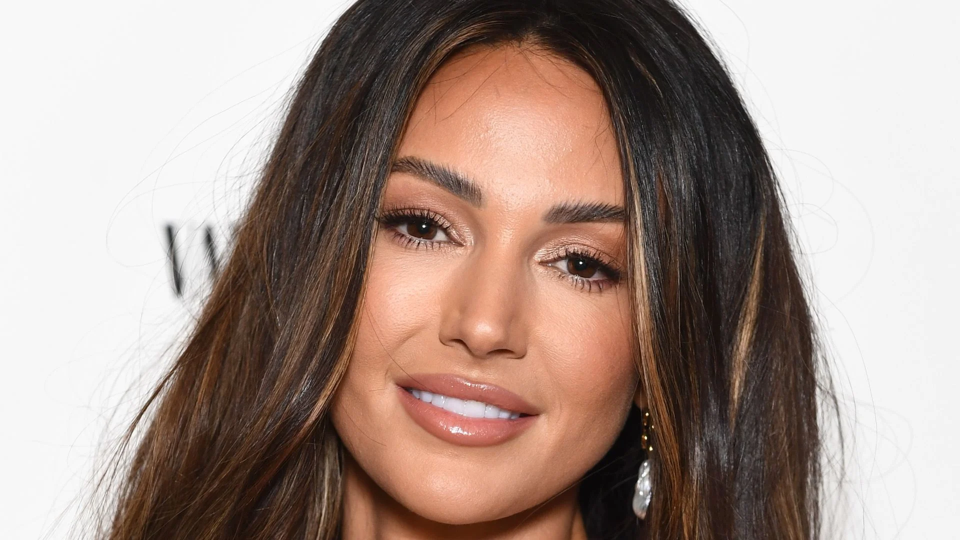Michelle Keegan goes retro in psychedelic '60s wedding guest dress