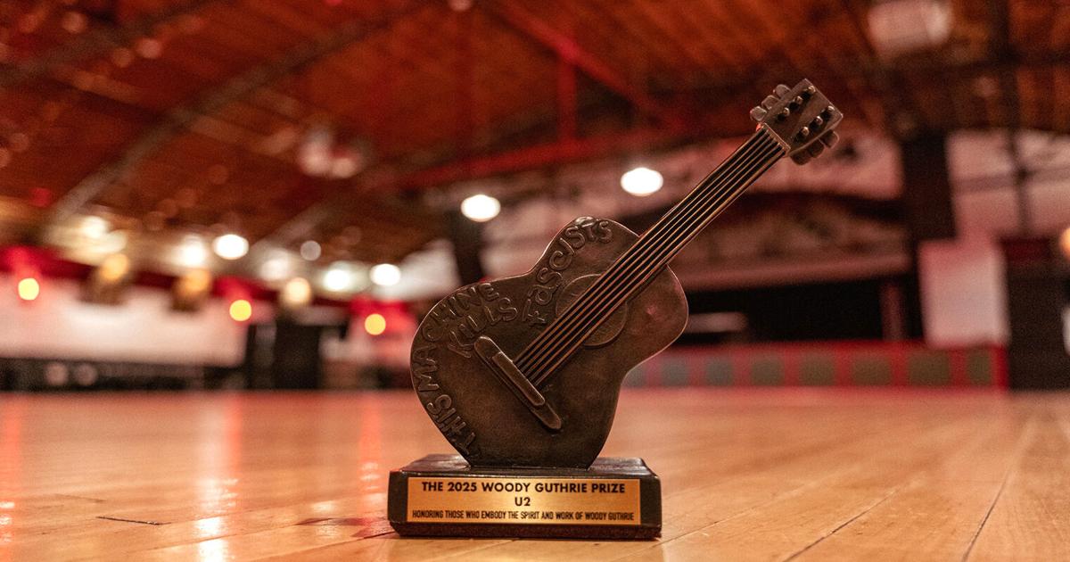 Bono, The Edge perform during Woody Guthrie Prize ceremony