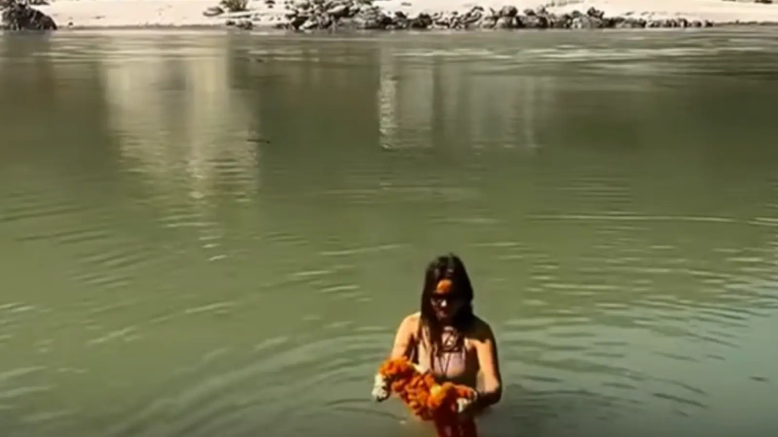 Woman In Bikini Takes Holy Dip In River Ganga, Sparks Debate: ‘Aadmi Log Kachha Pehn Kar Nahaye Toh...’  | Video