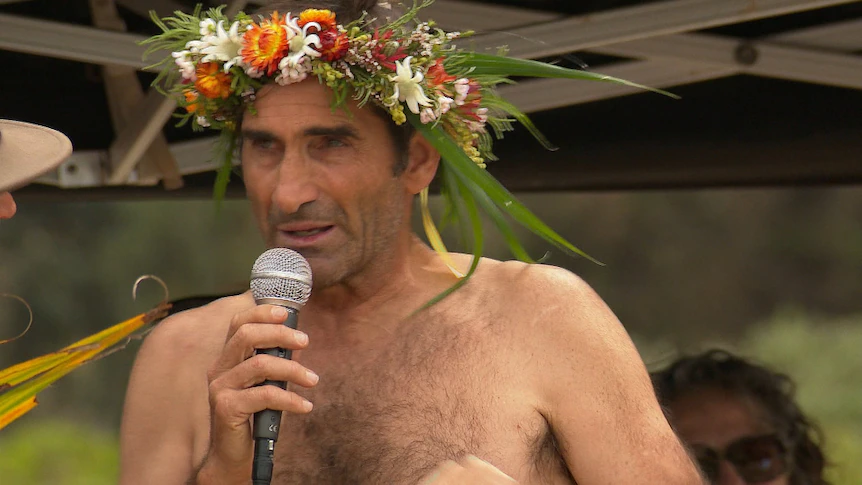 Twin brother of shark victim's emotional tribute as he leads paddle out