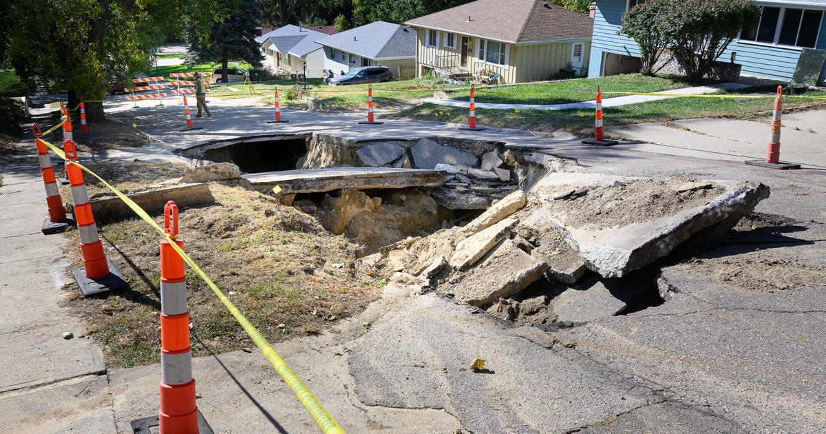 Sioux City street now seeing repair and replacement work after massive cave-in