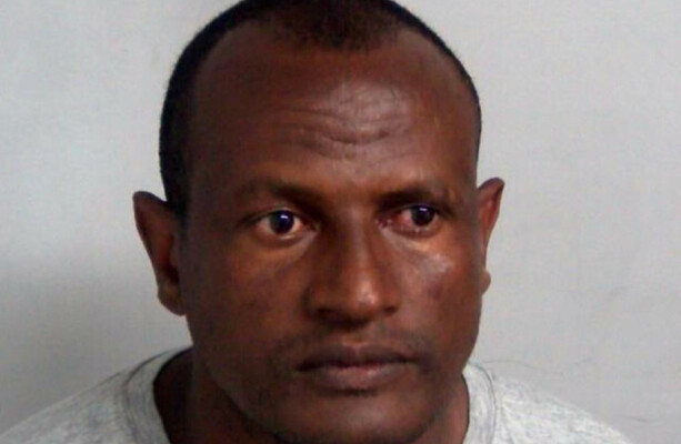 Manhunt continues in England for asylum seeker released from prison by mistake