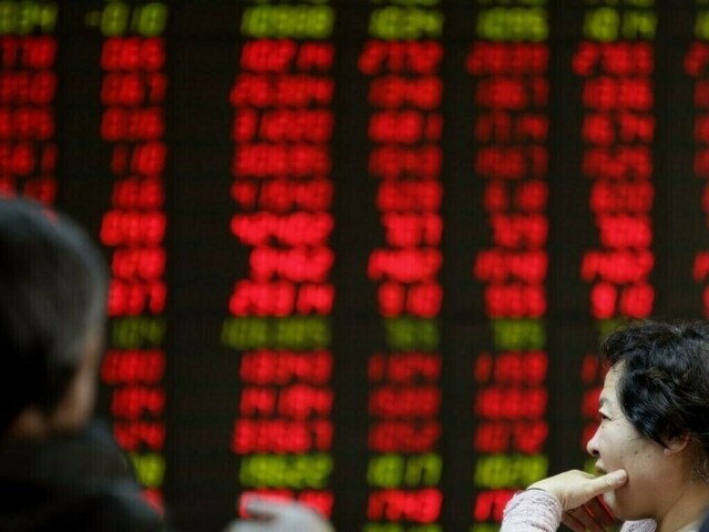 Shanghai stocks hit 10-year high as chip, AI shares jump