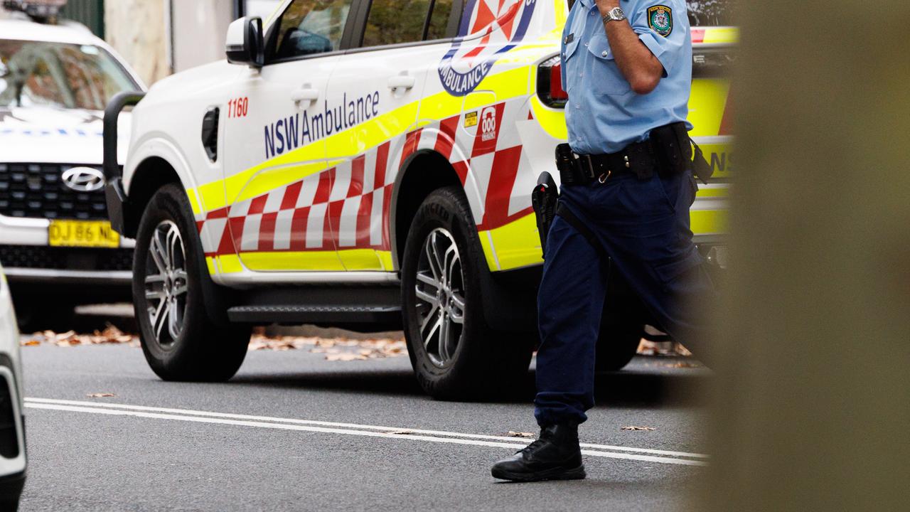 Woman struck by BMW outside cafe