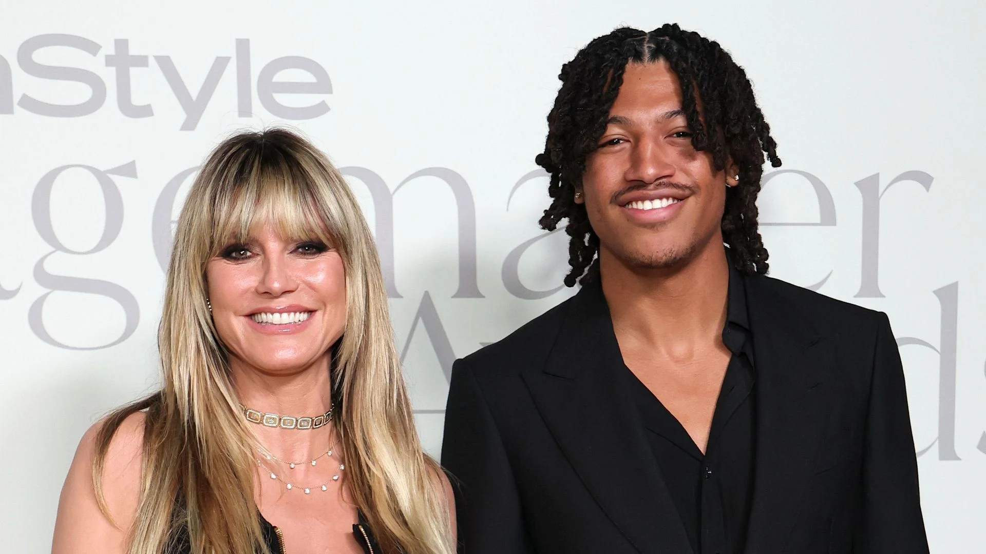 Heidi Klum wows in zip-up dress as she holds hands with model son on red carpet