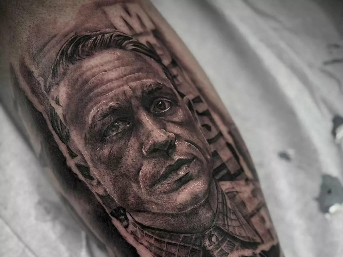 Horror fan gets 2ft tattoo of Ed Gein on his leg – but there's one major issue