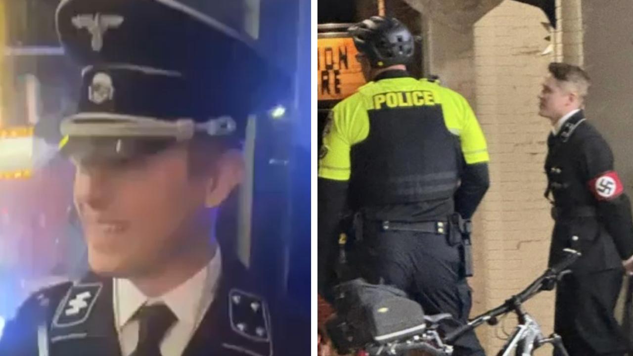Grinning man in full Nazi uniform brawls with Halloween revellers in wild video