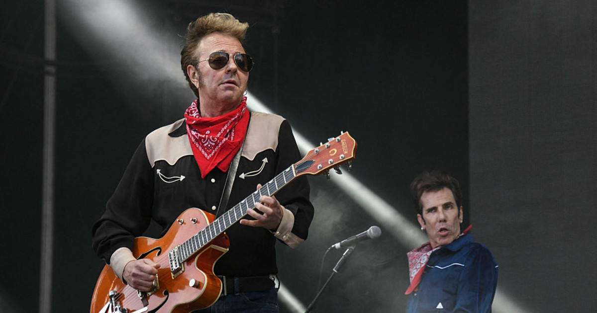 The Stray Cats Forced to Cancel Show Due to 'Serious Illness'