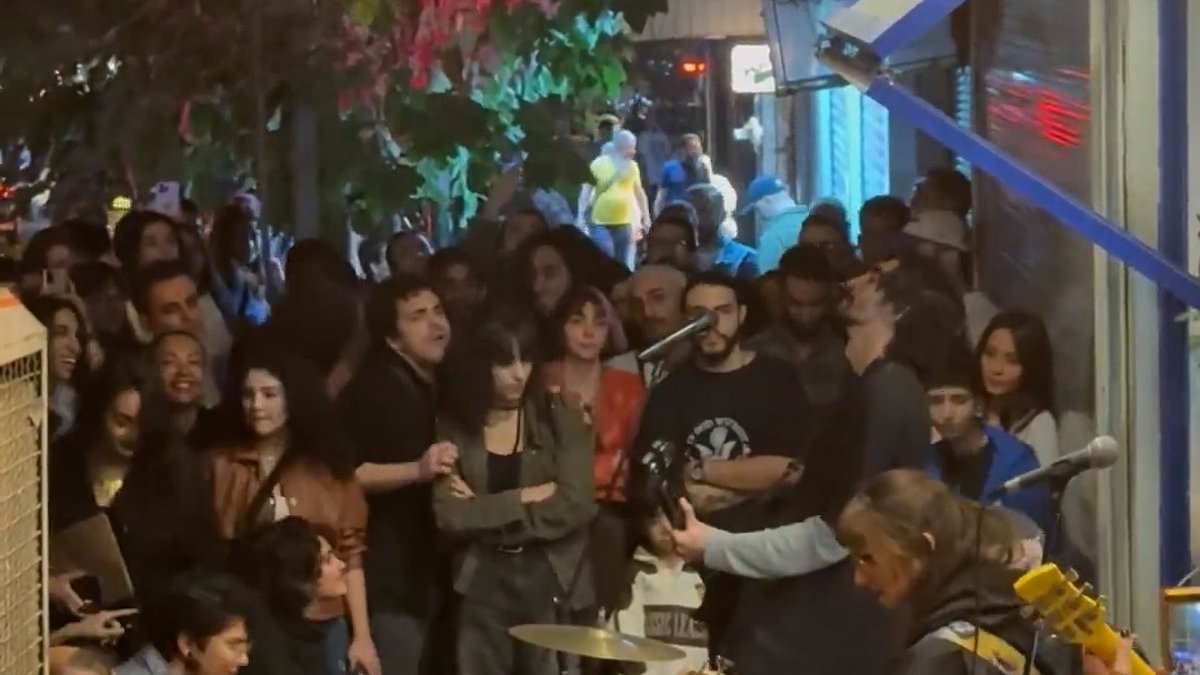 Brave women defy Iran's compulsory hijab ruling at street party as regime 'shuts down female singers' social media, accusing them of creating "criminal" content'