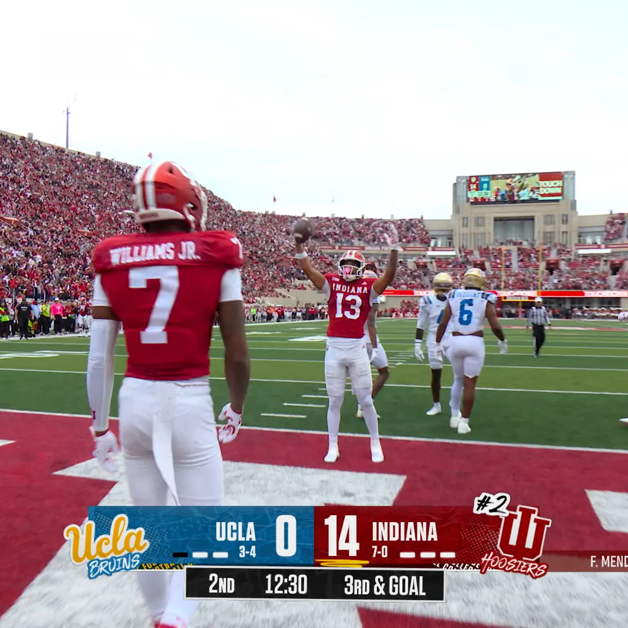 Fernando Mendoza finds Elijah Sarratt for a TD to put Indiana up 21-0 over UCLA