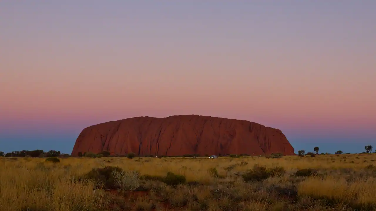 Rain, reflection and renewal: Uluru marks 40 years since historic handback