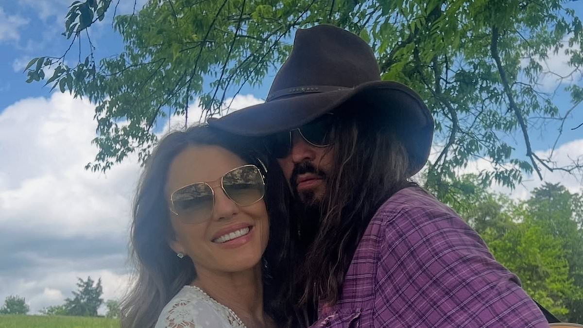 Elizabeth Hurley lifts lid on her ordinary life with boyfriend Billy Ray Cyrus from going to supermarket together, cutting each other's hair, learning the guitar and bird watching