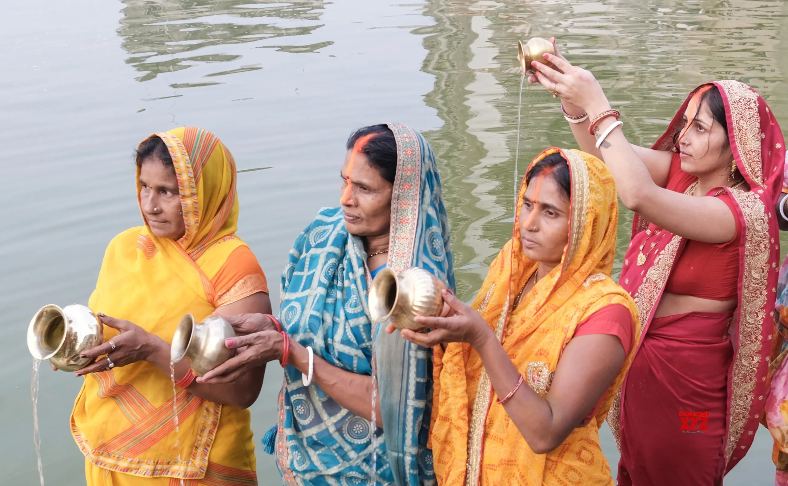 Dhanbad: Women Perform Rituals During Kharna Puja #Gallery