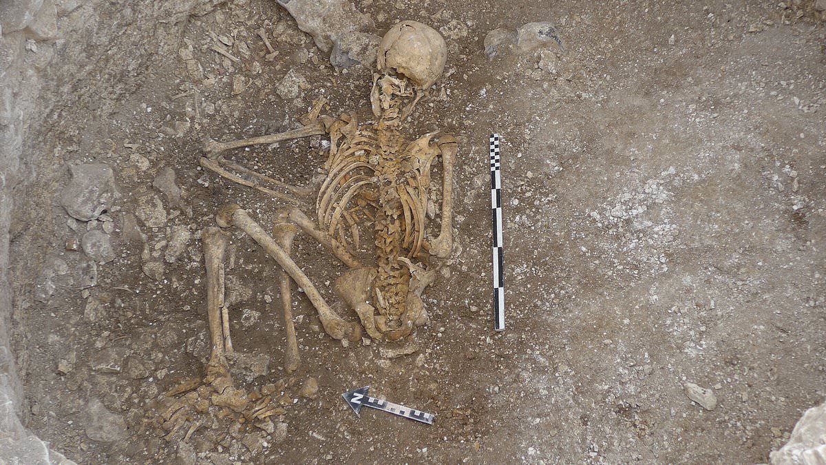How Iron Age Britons performed human sacrifices to tell the future: Unearthed 2,000-year-old body of woman, 25, whose throat was slashed by druids rewrites history books