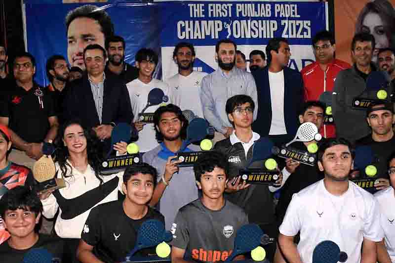 Federal Minister for Information and Broadcasting, Attaullah Tarar in a group photograph with the winning players and management during the closing ceremony of the First Punjab Padel Championship 2025, organized by the Punjab Padel Association at the Fift