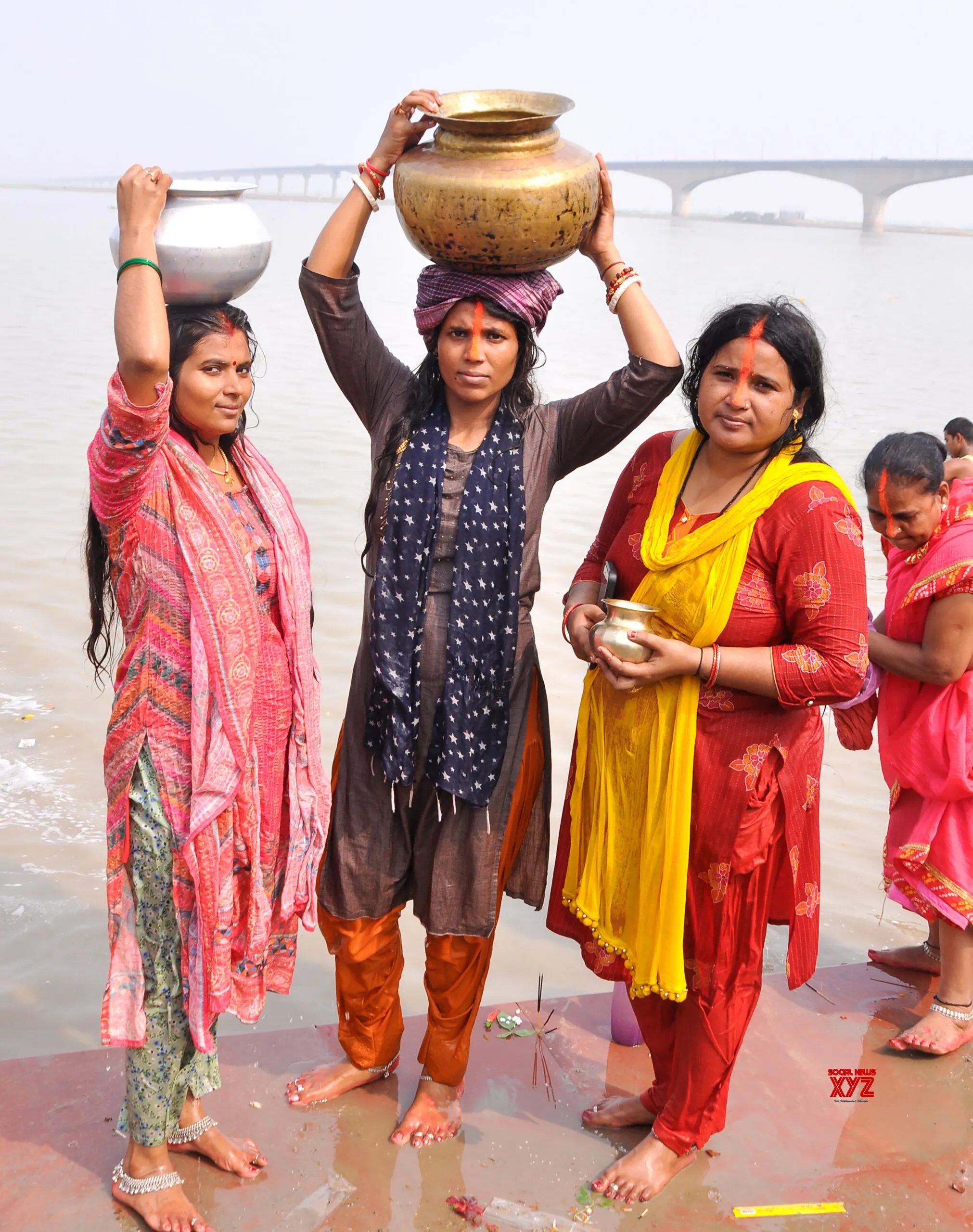 Bhagalpur: Women Carry Water for Chhath Puja Kharna #Gallery