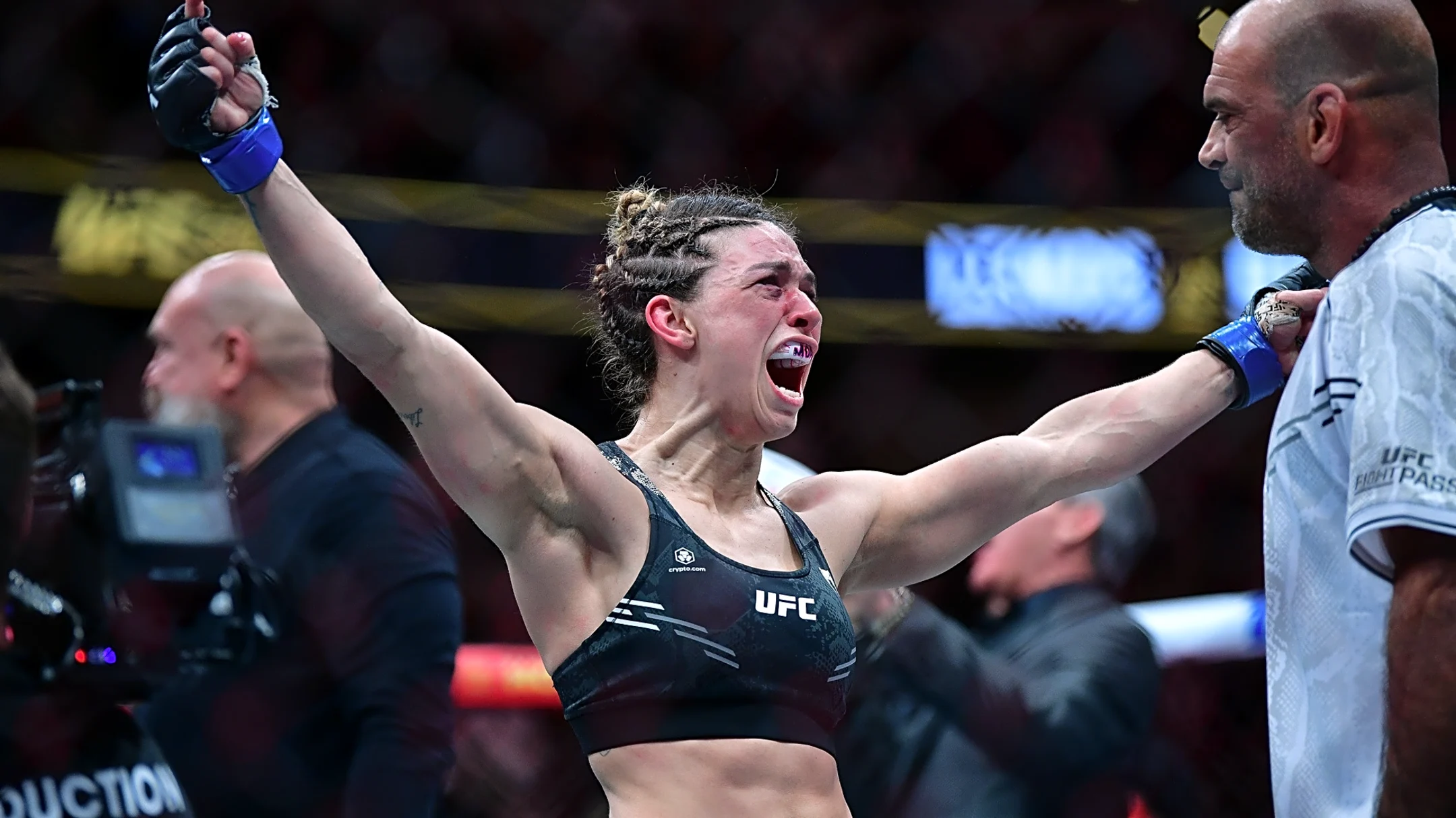 Mackenzie Dern breaks down in tears as she gives new belt to her daughter after UFC 321 win