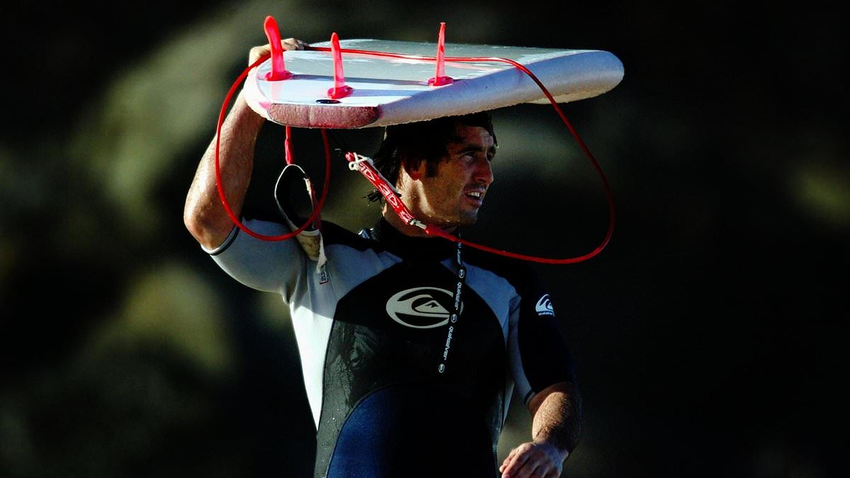 Andrew Johns cuts short surfing holiday because he believed the local monkeys were conspiring against him