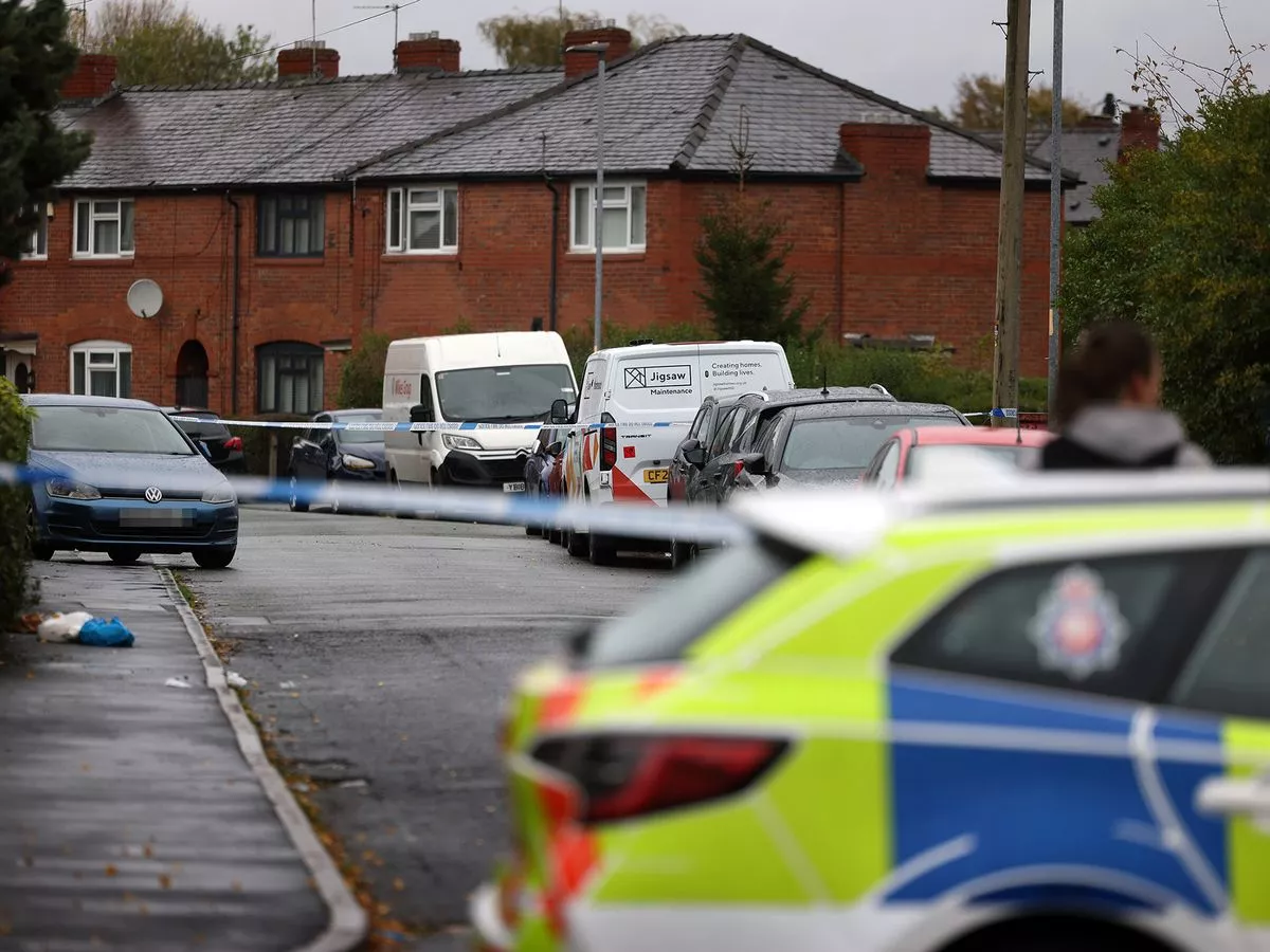 Police tape off street in north Manchester amid incident