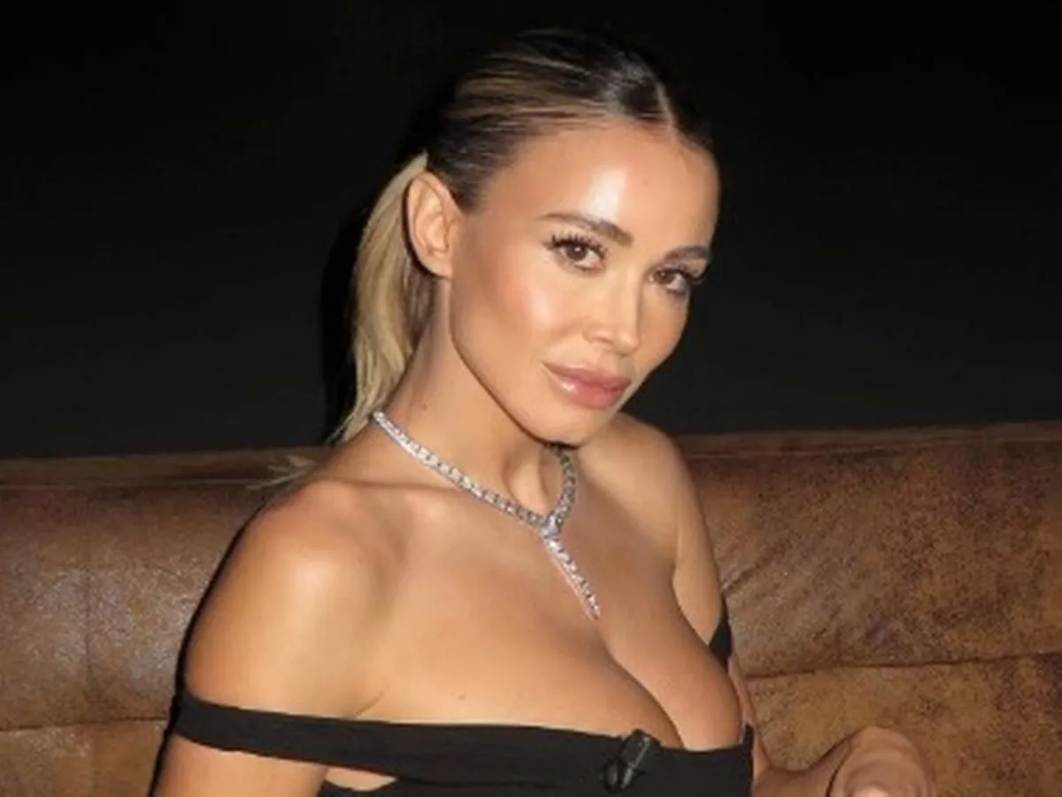 Ex-Premier League ace’s WAG shows off ‘big talents’ on TV as dress branded ‘unnecessary’