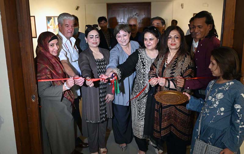 Chairperson of Benazir Income Support Programme (BISP), Senator Rubina Khalid, cutting the ribbon to inaugurate the exhibition “Sindhu Sur (Melody of Sindhu)” at PNCA. The exhibition, organized in collaboration with Nomad Gallery and curated by Nageen Hya