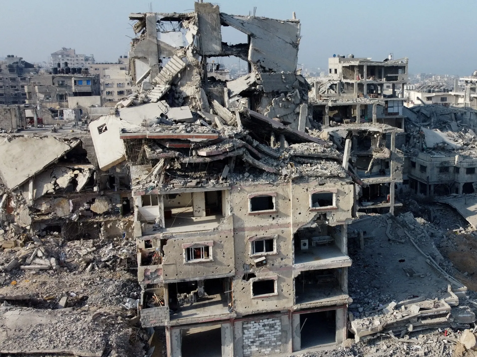 LIVE: Unexploded bombs threaten lives in Gaza; search for bodies continues