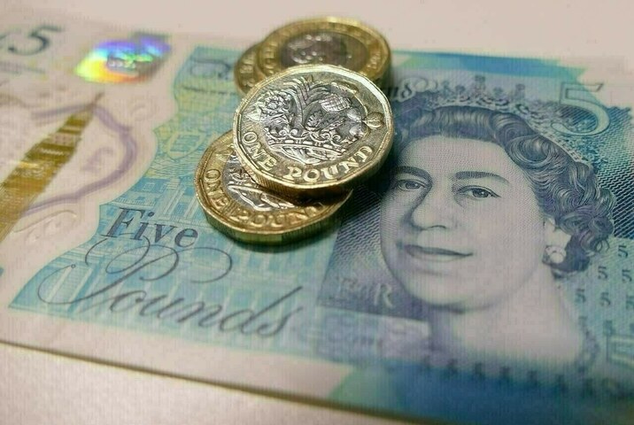 Sterling steady after upbeat data