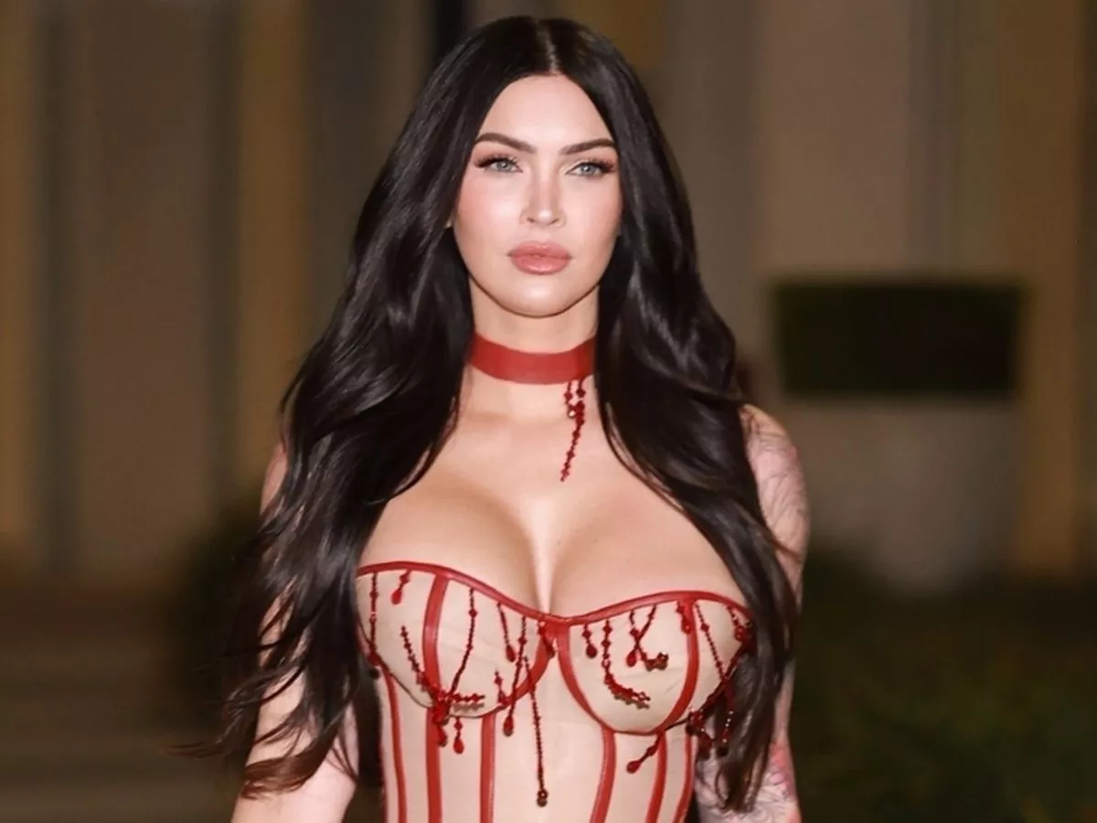 Megan Fox looks sensational as she makes rare outing in eye-catching dress