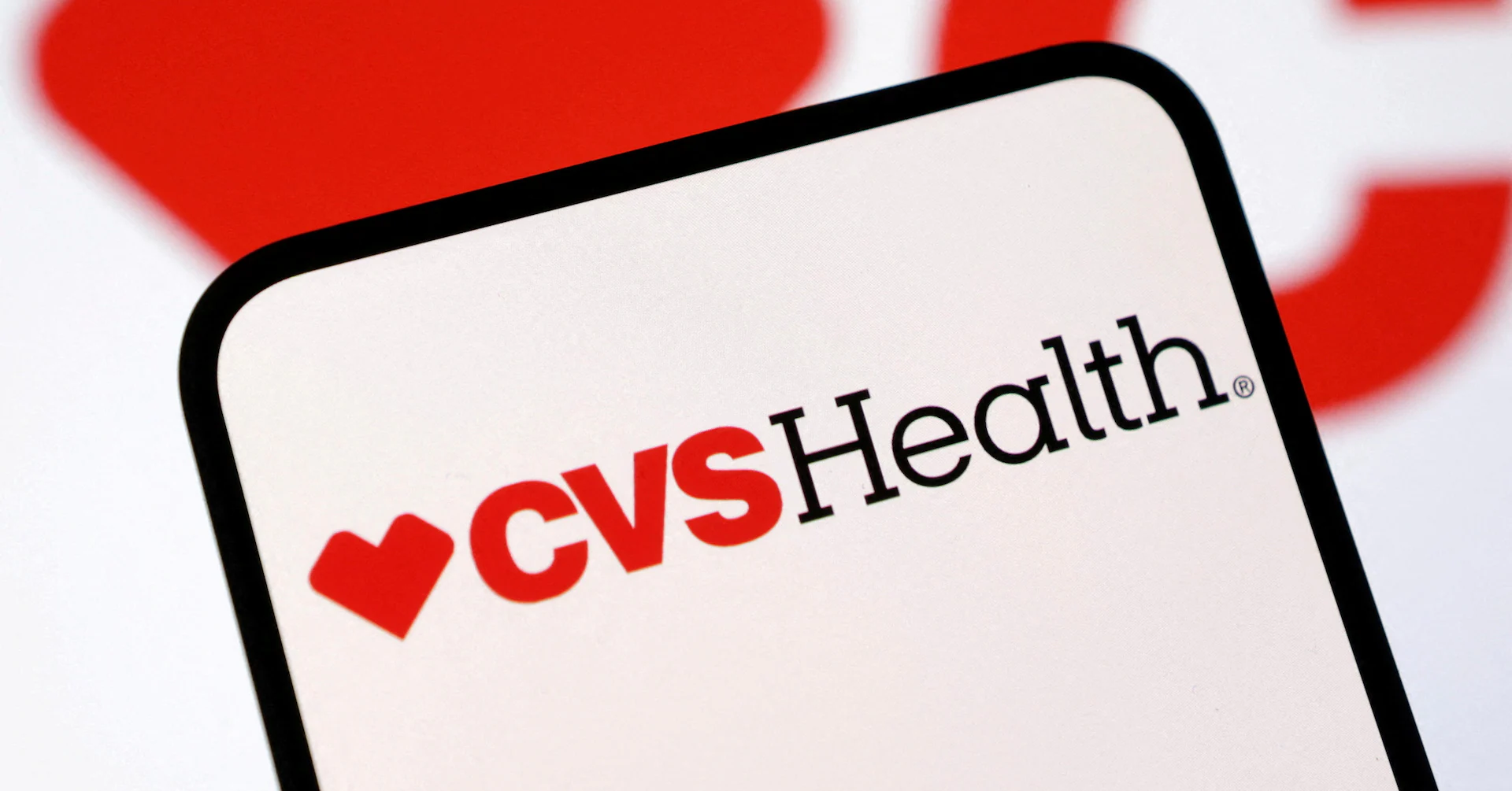 CVS raises full-year forecast, takes $5.7 billion impairment charge on health clinics