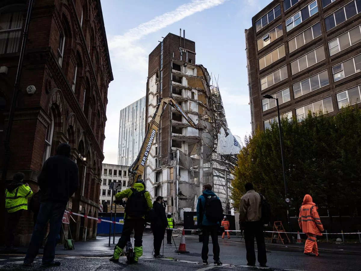 Contractor at demolition site where building dramatically collapsed issues statement