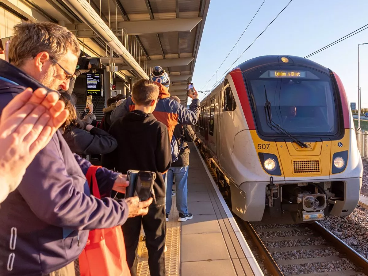 UK's first new train station in 100 years opens as crowds gather on platform