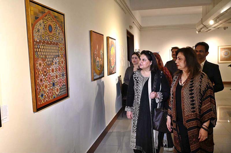 Chairperson of Benazir Income Support Programme (BISP), Senator Rubina Khalid, viewing artwork after inaugurating the exhibition “Sindhu Sur (Melody of Sindhu)” at PNCA. The exhibition, organized in collaboration with Nomad Gallery and curated by Nageen H