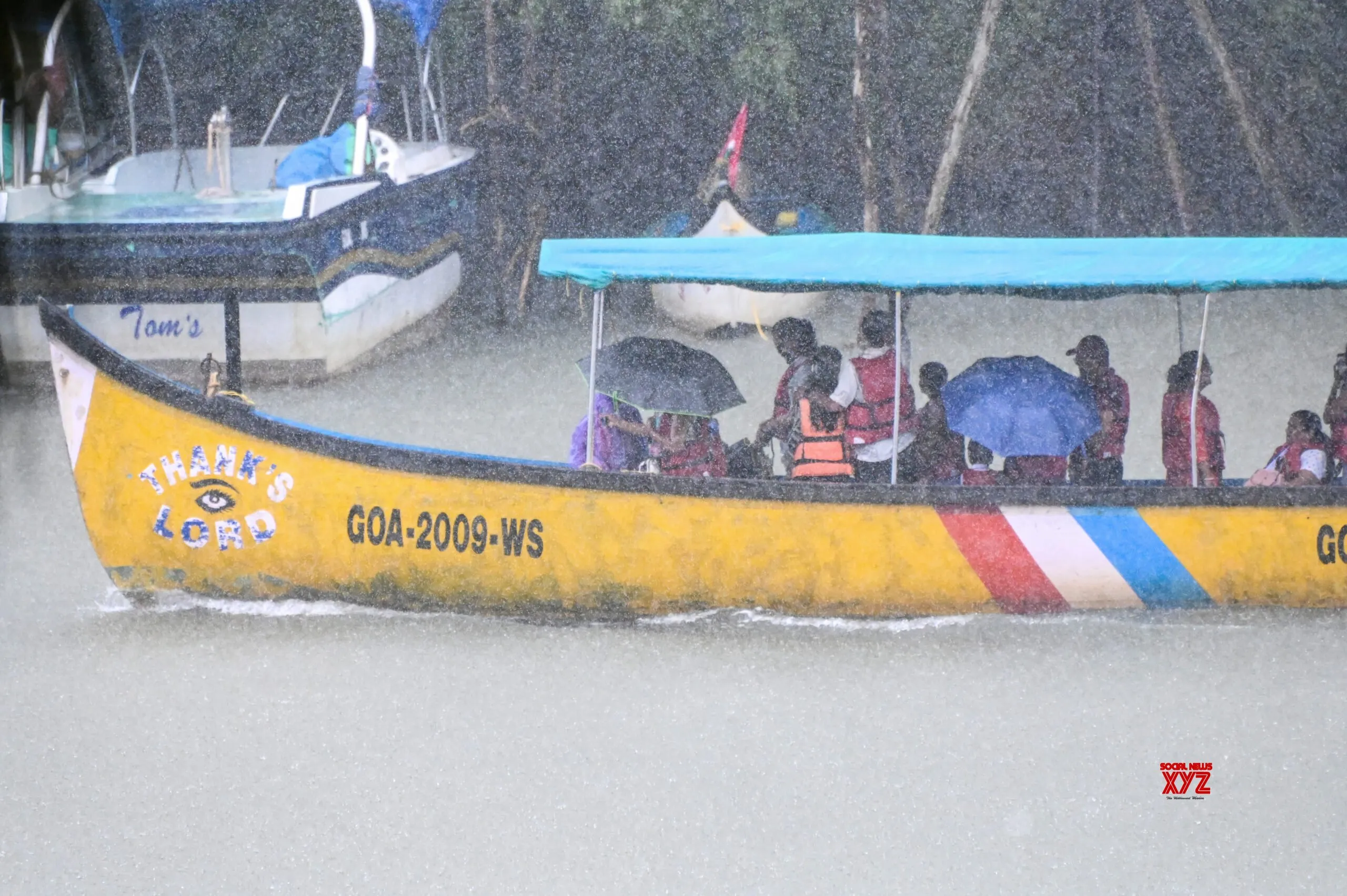 Panaji: Tourists Enjoy Boat Ride Amid Rain #Gallery