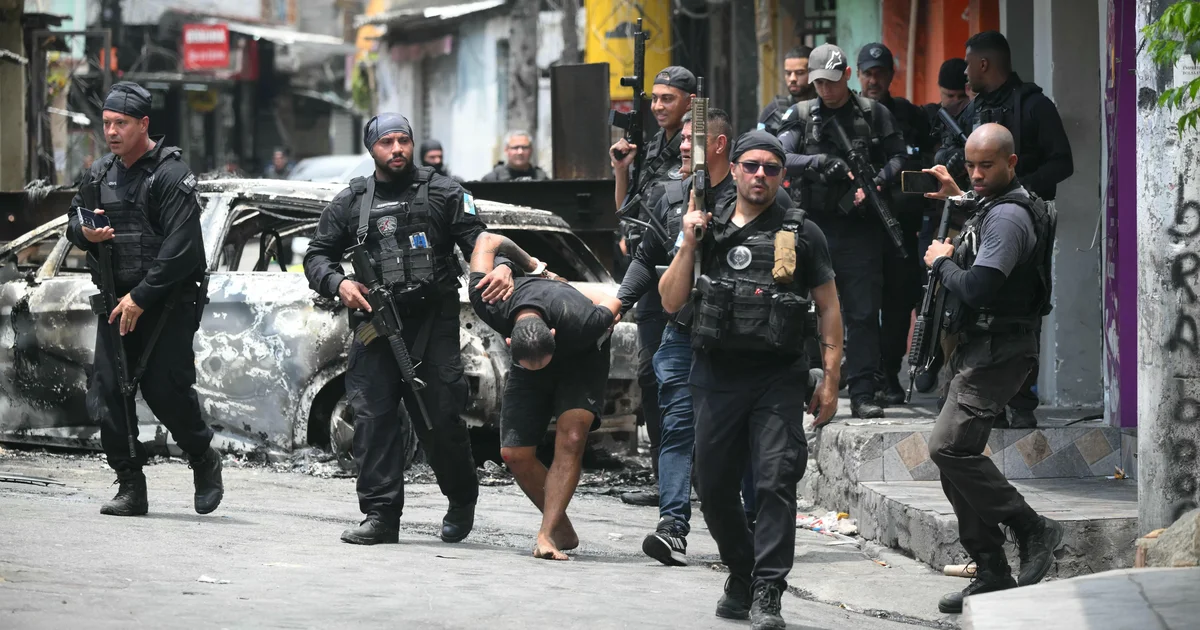 Raid on gangs in Rio de Janeiro leaves at least 64 people dead, including police officers