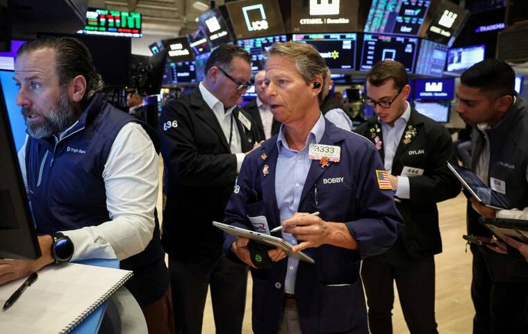 Wall Street hits new highs on tech earnings, trade optimism