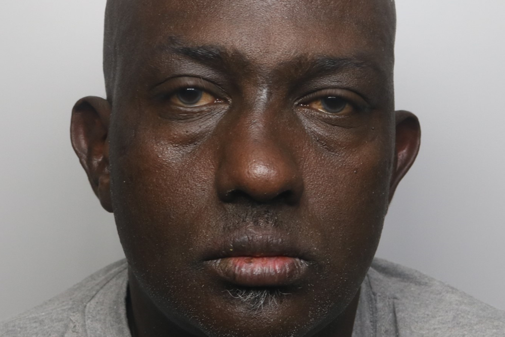 Small boat migrant jailed for at least 25 years after murdering bank customer