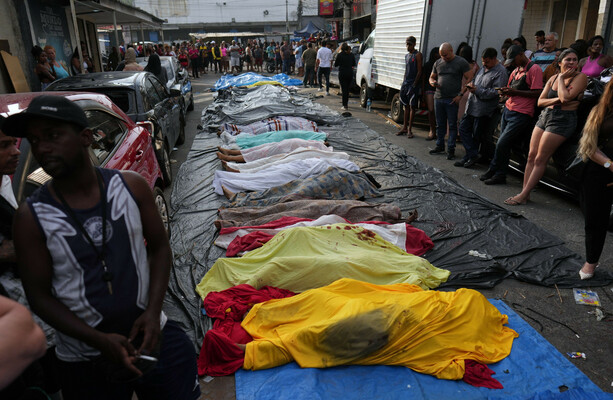 Rio de Janeiro residents line streets with bodies after Brazilian police raid leaves 119 dead