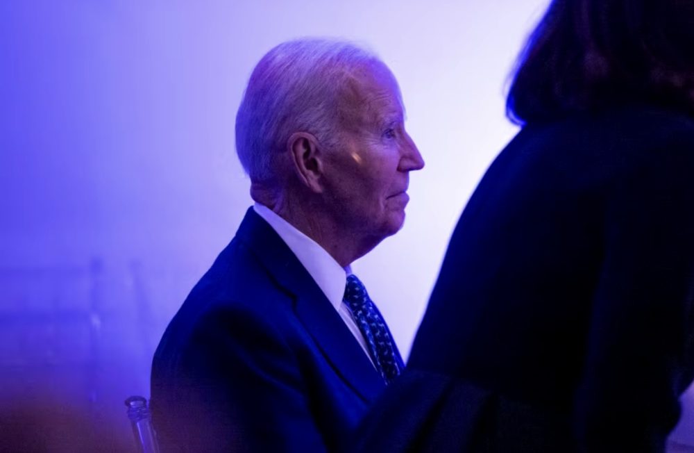 Biden warns of dark days for U.S