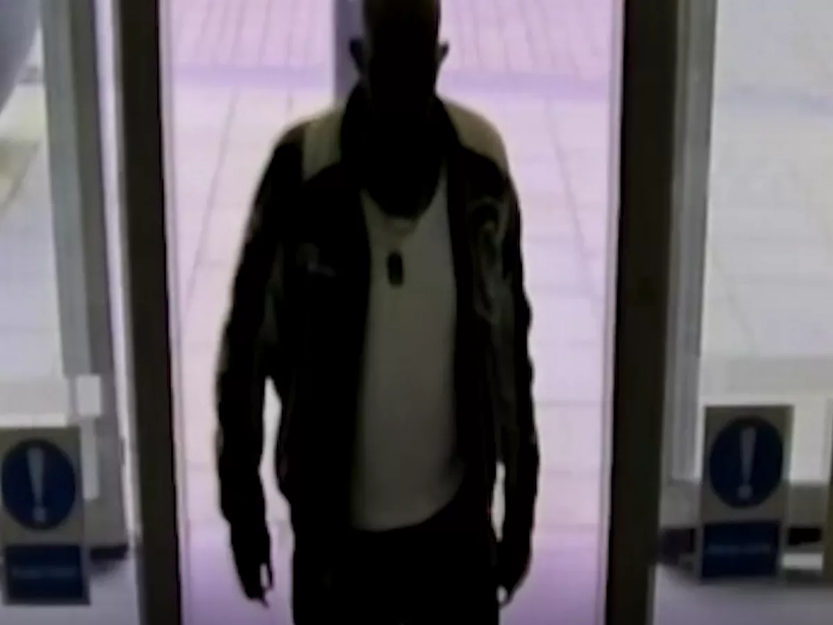 Moment murderer casually walks into Lloyds Bank before stabbing beloved dad to death