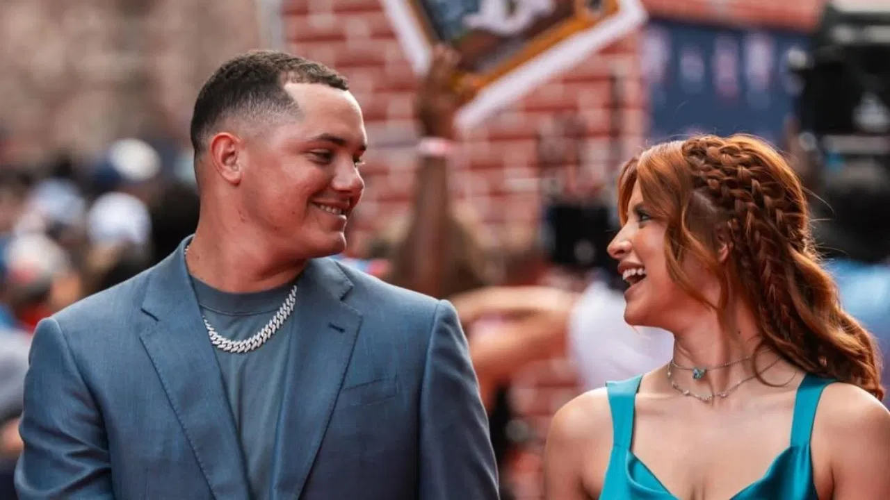 Adrian Morejon's wife Melany soaks up the sun in a neon pink bikini during relaxing poolside snap